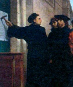 Монах Мартин Лютер прибивает к дверям Замковой церкви свои 95 тезисов